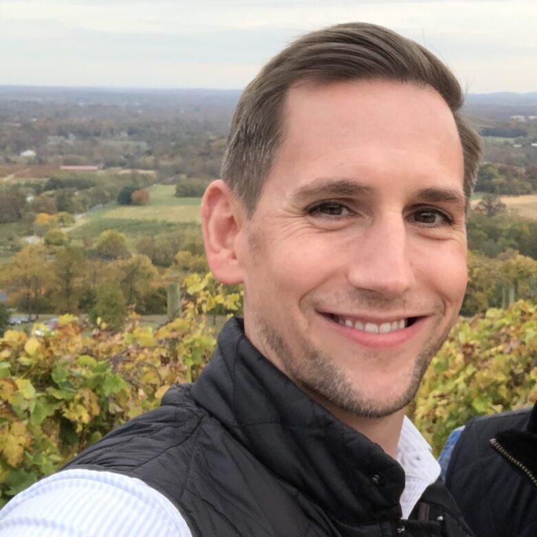 Blake Jones at Bluemont Vineyard in Bluemont, Virginia. Fall colors are seen in the valley below